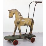 A Lines Brothers painted wooden push-along horse, 1930s