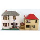 Two wooden child’s dolls houses, 1920s/30s