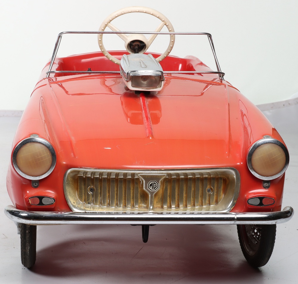 A Tri-ang Toys rare and early hard plastic MG Midget child’s pedal Sports car, English released 1963 - Image 3 of 11