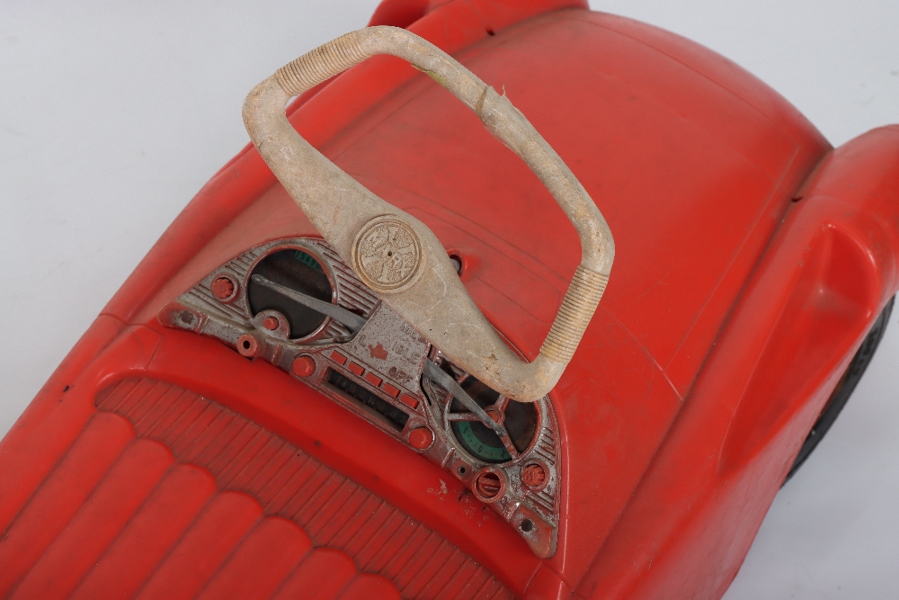 A Marx moulded plastic Triumph TR2 child’s sit on push-along Sports car, circa 1970 - Image 5 of 6