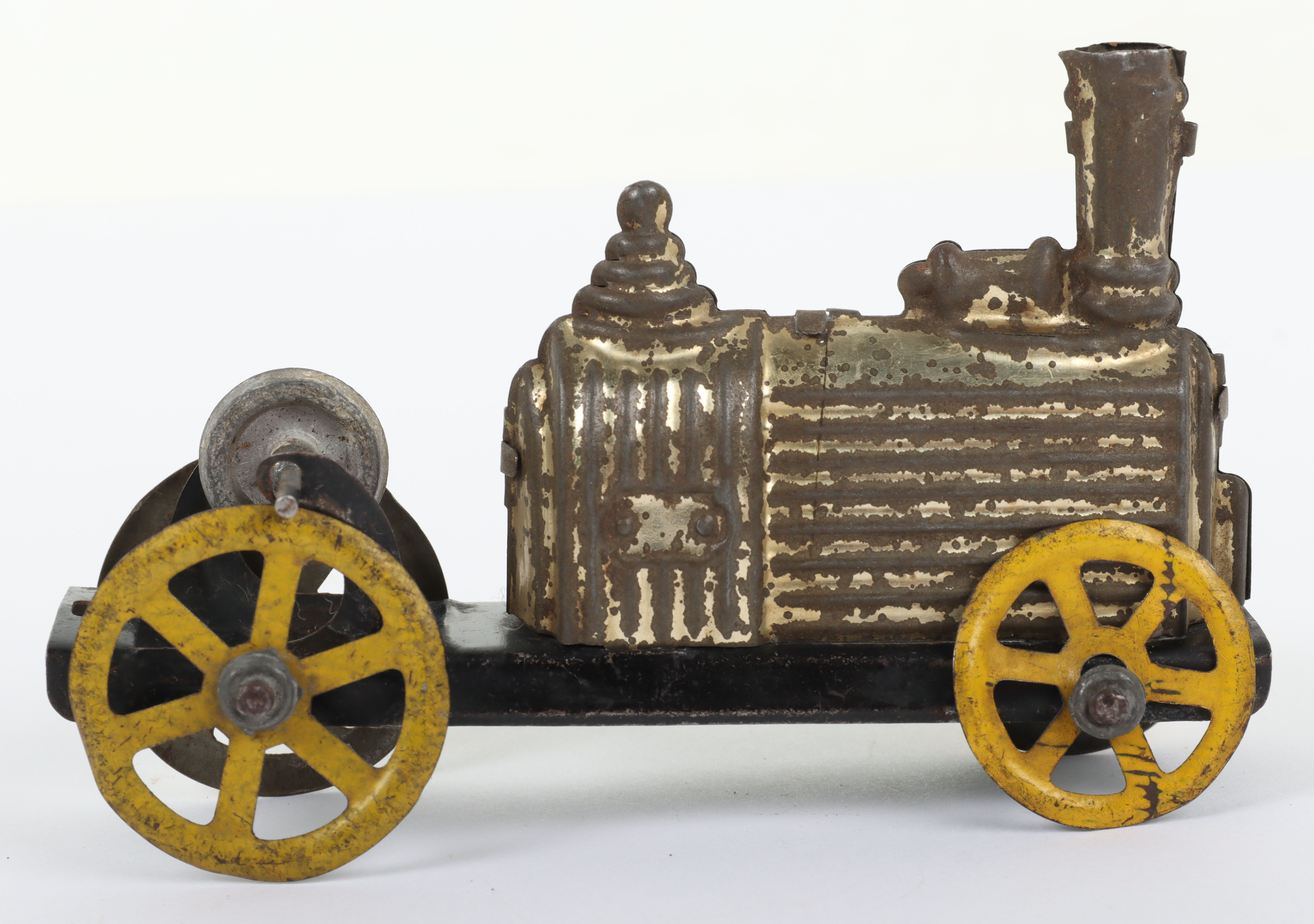 A C.R (Rossignol) pressed tinplate friction driven penny toy of an early locomotive, French circa 19 - Image 4 of 5