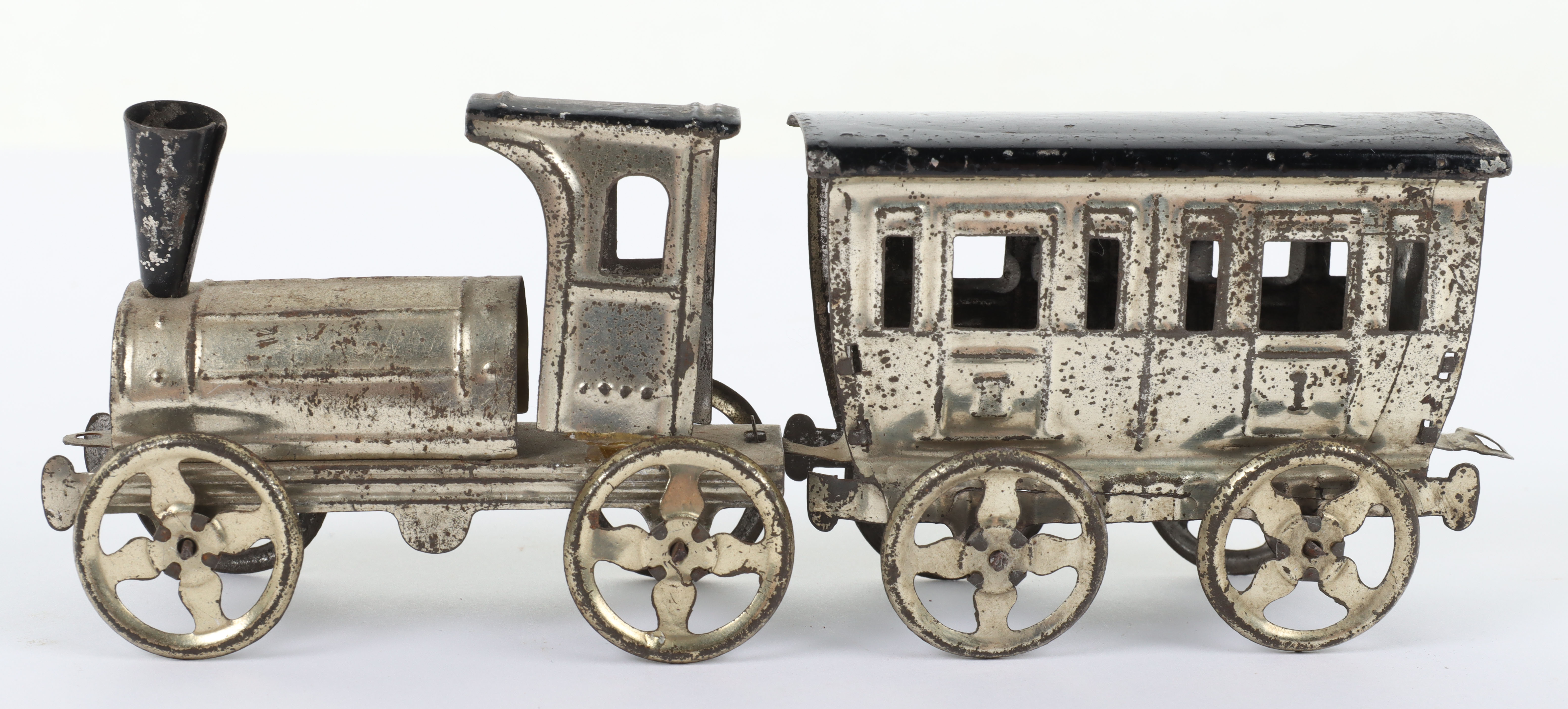 Early Meier pressed tinplate locomotive and carriage penny toy, German circa 1900