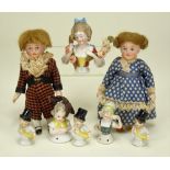 A pair of miniature all bisque dolls house dolls, German 1920s,