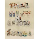 Collection of Dismal Desmond and other glazed china dog figurines,