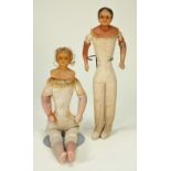 Two Early bees wax shoulder head dolls, English circa 1850,