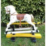 A painted and carved wooden Rocking Horse, English early 20th century,