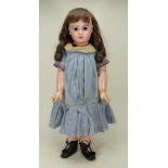 A Tete Jumeau closed mouth bisque head Bebe doll, size 12, French circa 1890,