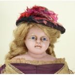 A Montanari poured wax shoulder head doll, English circa 1860