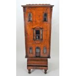 A fine walnut Dolls House, English 1820s/30s,