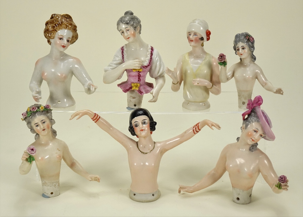 Seven 1920s glazed china half-dolls,