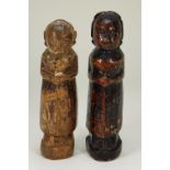 A pair of early carved Indian wooden stump dolls,