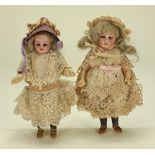 A pair of miniature Simon & Halbig bisque head dolls, German circa 1900,