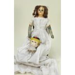 Wax over composition shoulder head doll, English circa 1860,