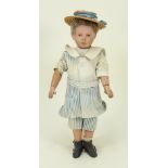A carved wooden Shoenhut doll, German circa 1910,