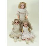 Three German bisque shoulder head dolls, circa 1915,