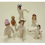 Six 1920s glazed china half-dolls,