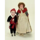 A poured wax shoulder head doll in French Nurses uniform, German circa 1900,