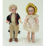 A sweet small size Simon & Halbig and Kammer & Reinhart pair of bisque head dolls, German circa 1910