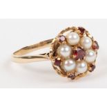 A 9ct gold, pearl and garnet cluster ring