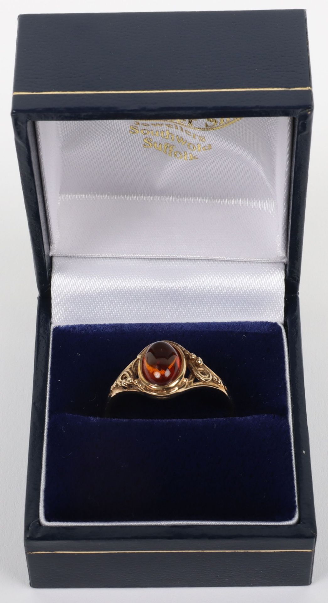 A 9ct gold and amber single stone ring - Image 2 of 7