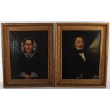 A pair of 19th century Continental oil on canvas portraits, German, of man and wife