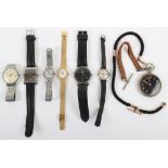 A selection of watches and a military style pocket watch