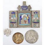 A naïve metal and enamel triptych icon