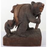 A Japanese wood carved bear and cub