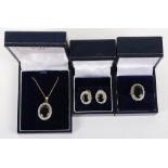 A set of three 9ct diamond and sapphire including ring, pendant necklace and earrings