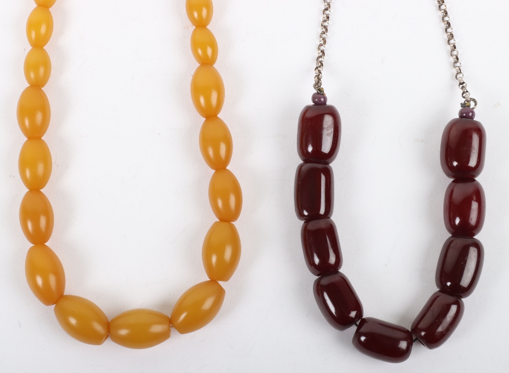 A cherry amber bead necklace on silver chain - Image 2 of 3