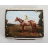 A silver pill box with enamel horse rider to the lid, London import marks