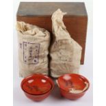 A Japanese red lacquer rice bowl set,