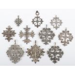 Ten Russian silver and other pendant crosses