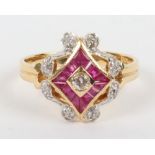 An 18ct diamond and ruby dress ring,