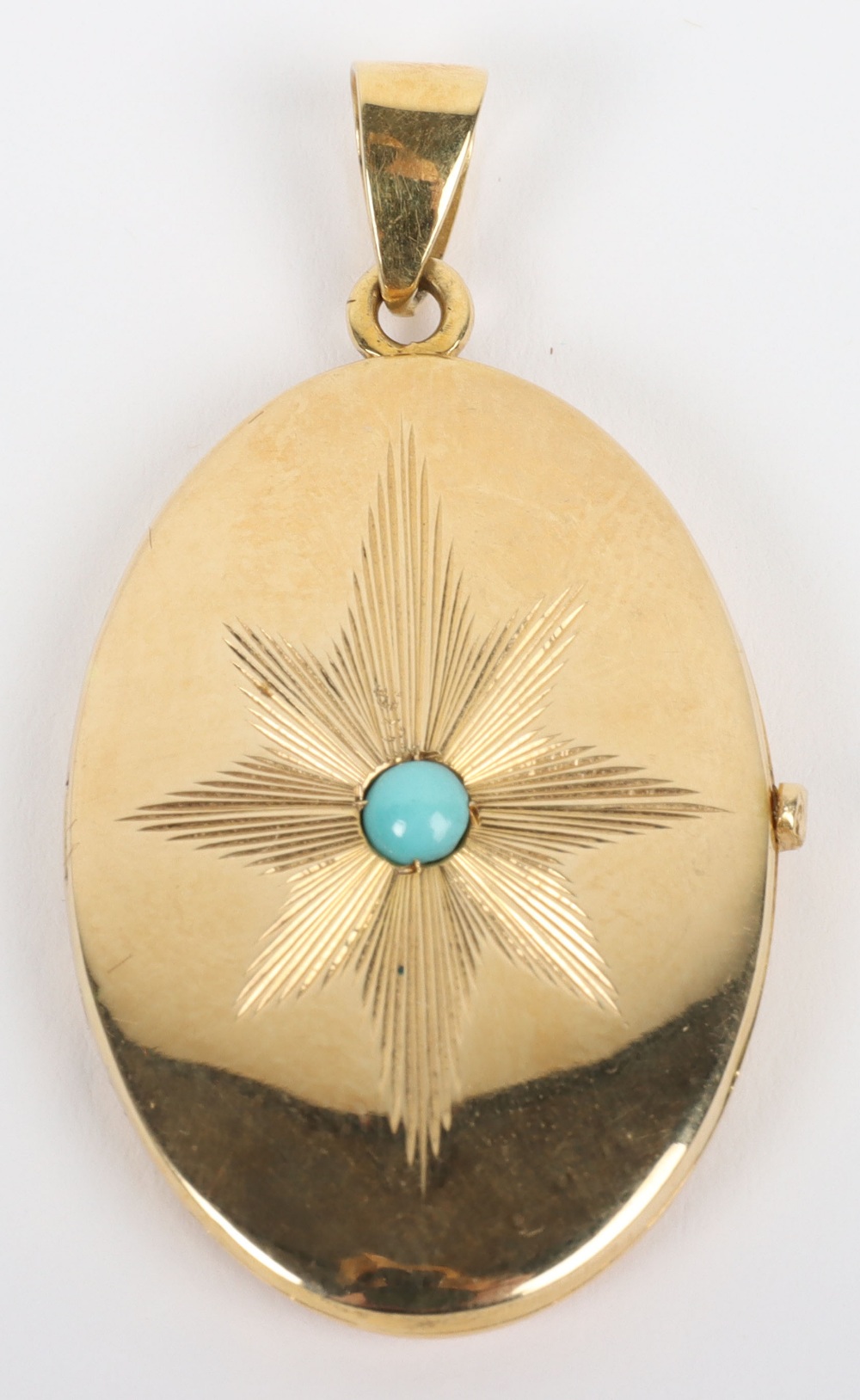 An 18ct gold and turquoise pendant locket