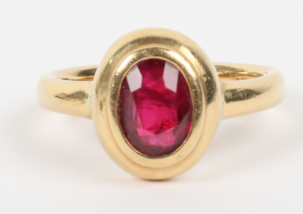 An 18ct gold and ruby set signet style ring