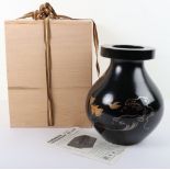 A Japanese 20th century black lacquer and painted vase