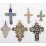 Six Russian silver and other pendant crosses