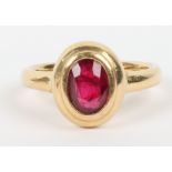 An 18ct gold and ruby set signet style ring