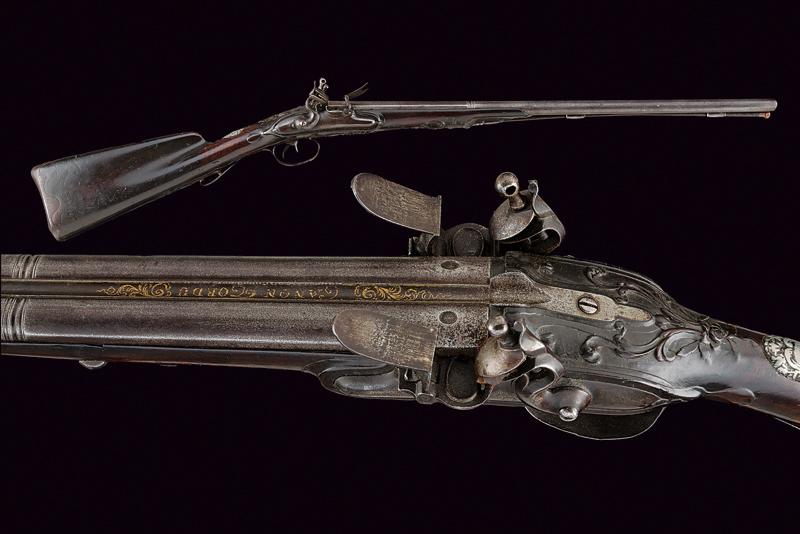 A double barreled flintlock gun by Halmazet Freres