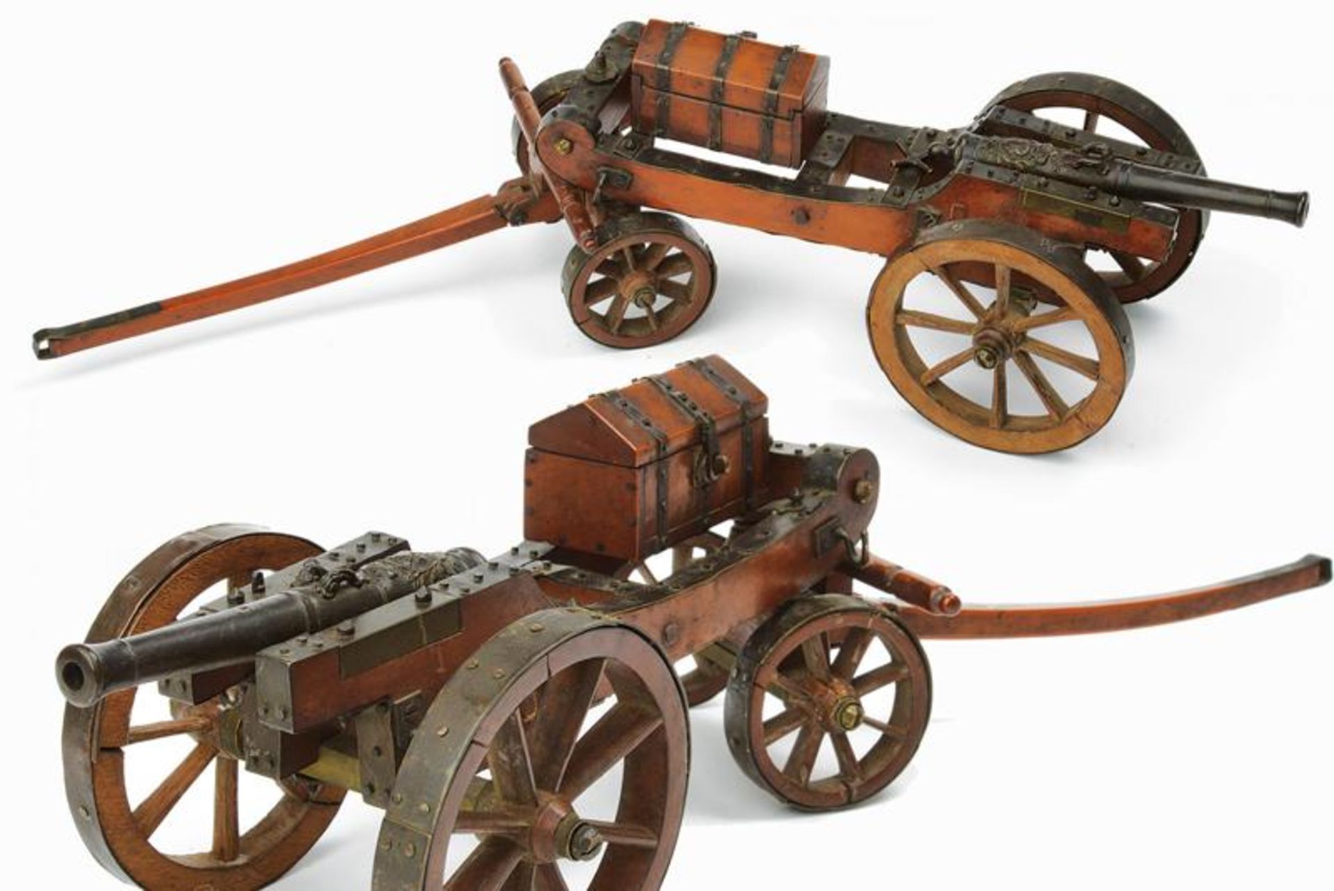 A miniature table cannon with support and limber