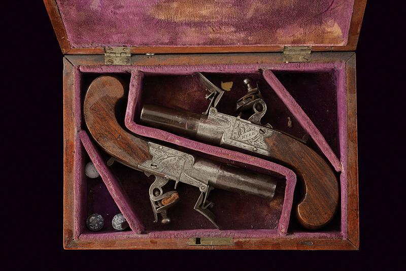 A pair of cased flintlock pocket pistols by Hill