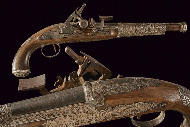 A silver mounted flintlock pistol