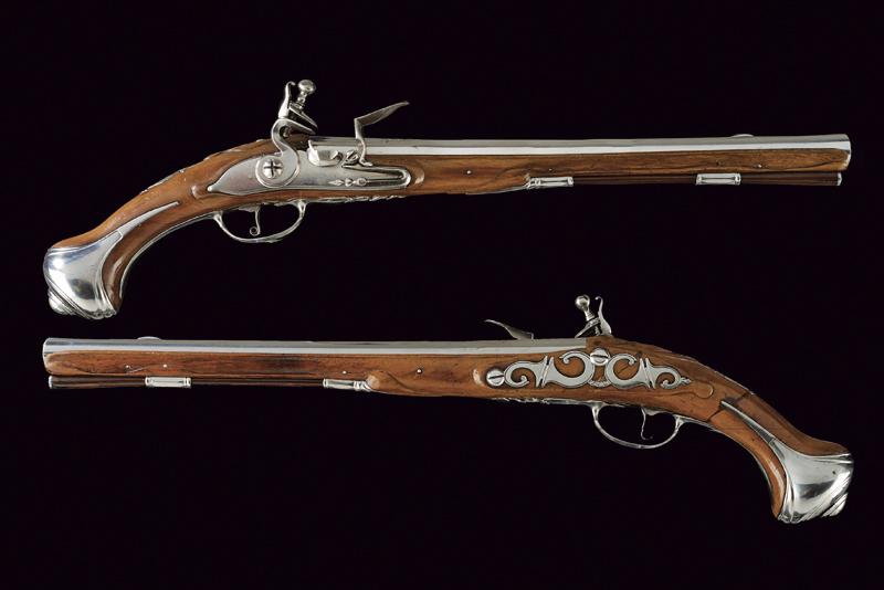 A pair of flintlock holster pistols