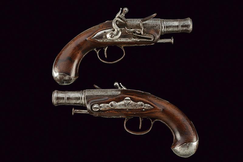 A pair of travel flintlock pistols