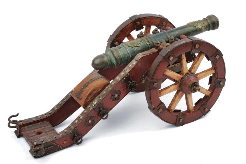 A fine bronze cannon model with carriage