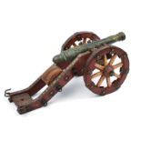 A fine bronze cannon model with carriage