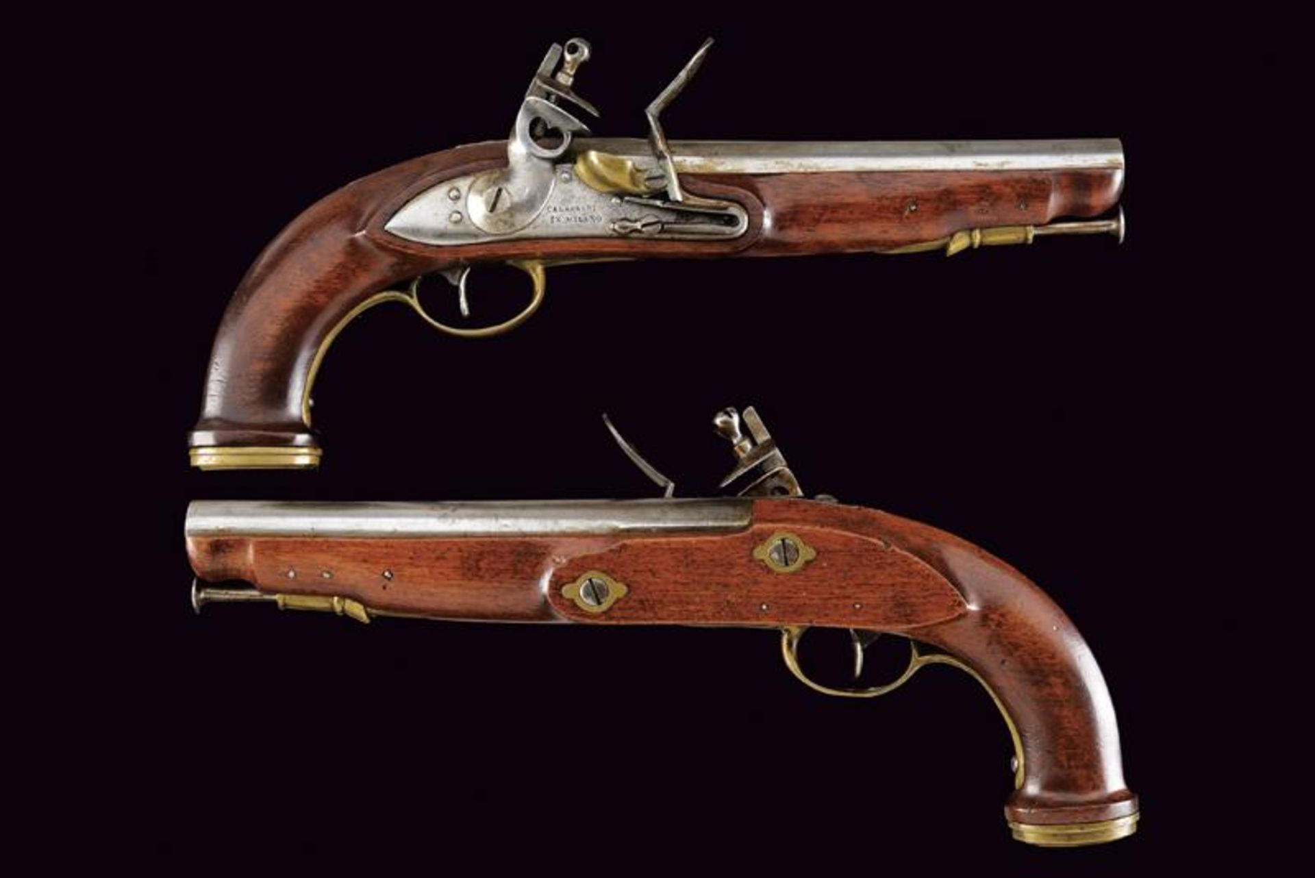 A rare and interesting pair of Royal Guard officer's flintlock pistols