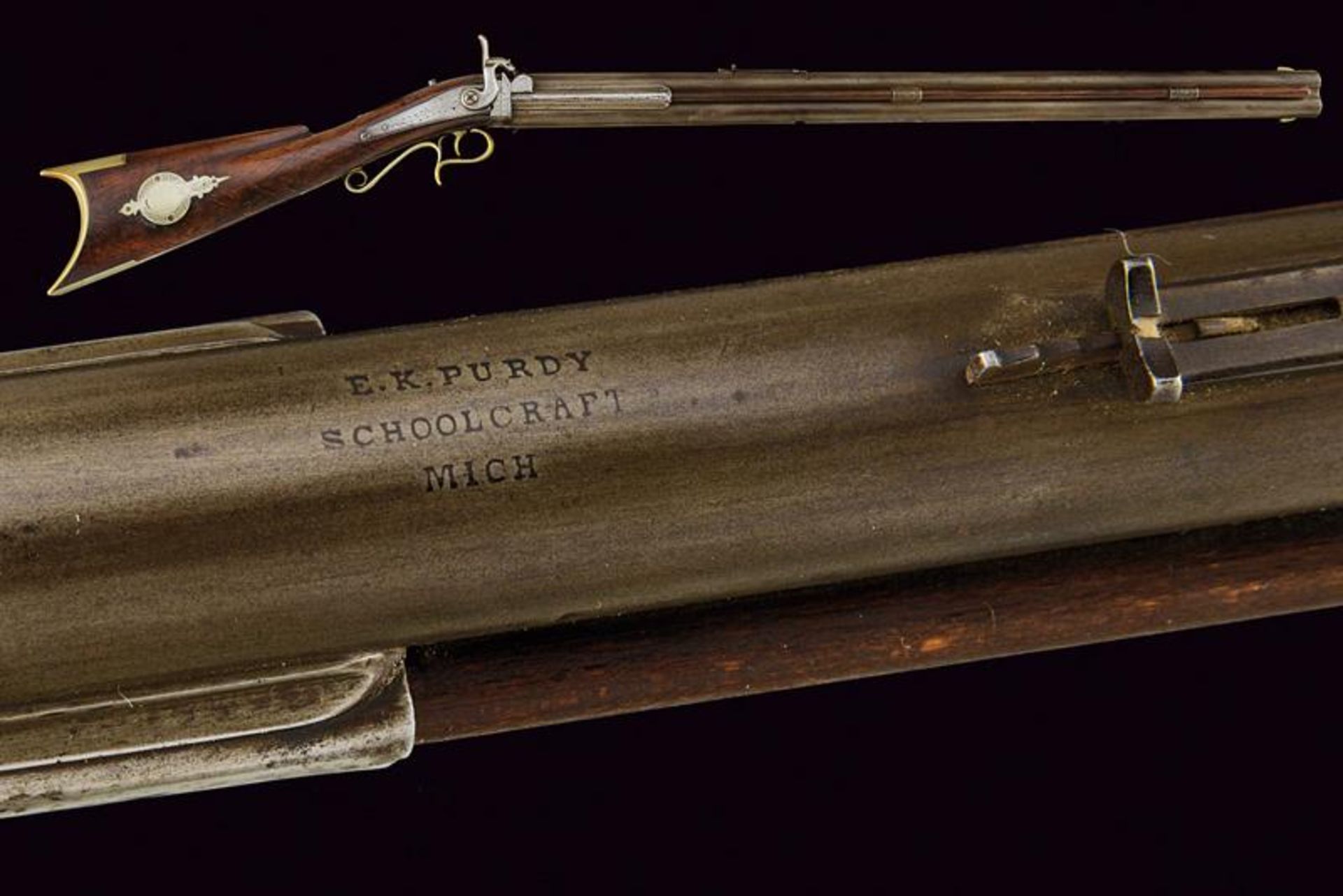 A rare over and under barreled turnover percussion target rifle