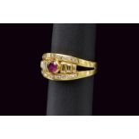 Diamond and ruby gold band ring